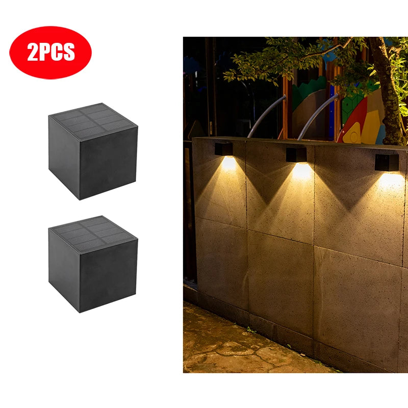 Luminaire exterieur noir mat créant des jeux d’ombres et de lumière élégants